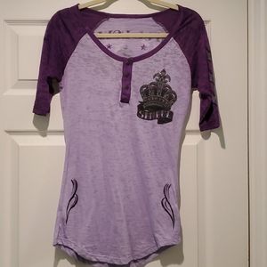 Women's Sinful brand tee.